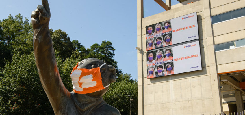Tiger statue outside Memorial Stadium with Clemson mask on