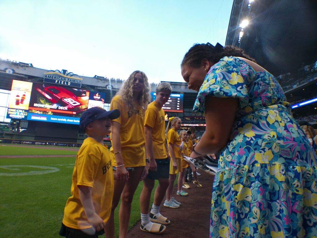 Melody Chambers assisting an in-stadium experience for fans