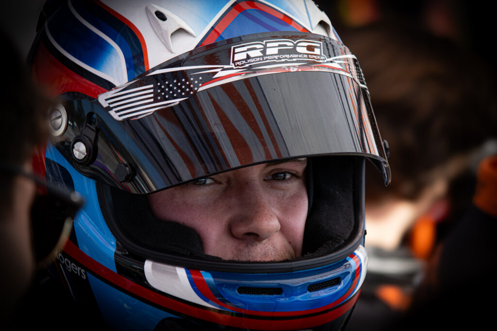 Kieran Rogers prepares to enter the car for the final stint of Saturday's race.
