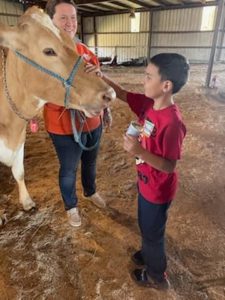 2nd graders had hands-on opportunities to learn where their meat and milk come from.