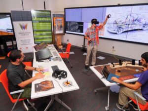 One of the early R-Initiative Recipients, Brygg Ullmer, chair of the university’s Human-Centered Computing Division, received additional external funding from the National Science Foundation to develop a customizable, hands-on virtual reality and advanced display system, pictured. 