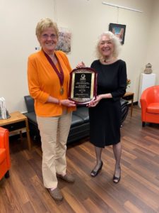 Elaine Richardson and Debbie Jackson with award plaque