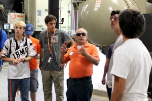 Sam Zanca provides a tour of the plant to a class.
