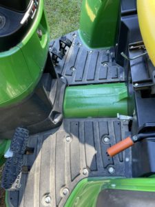 The hydrostatic transmission does not have a clutch to change gears and just has simple forward-reverse pedals. Photo credit: Stephen Pohlman, Clemson Extension