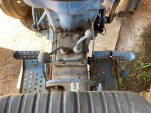 Gear driven tractors require clutching to change gears. Photo credit: Stephen Pohlman, Clemson Extension.