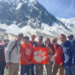 Group of Students with Tiger Rag, with Mountain range in the background