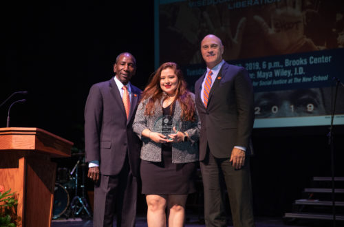 Student Amanda Arroyo receives MLK award.