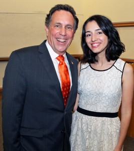 Photo of Raquel Anido received the Gentry Award for Teaching Excellence in the Humanities. Anido is pictured the Rich Goodstein, dean of the College of Architecture, Arts and Humanities.