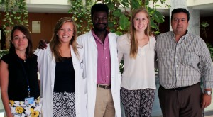 Photo of Students Natalie Kimmey, Chardrevius Martin and Elouis Cram (center) who interned with staff at the San Juan de Dios del Aljarafe Hospital in Seville, Spain.