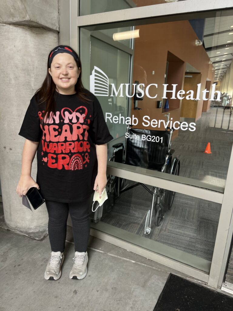 Woman standing in front of MUSC Health building