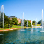 Outdoors picture of the Clemson fountains on a sunny day.