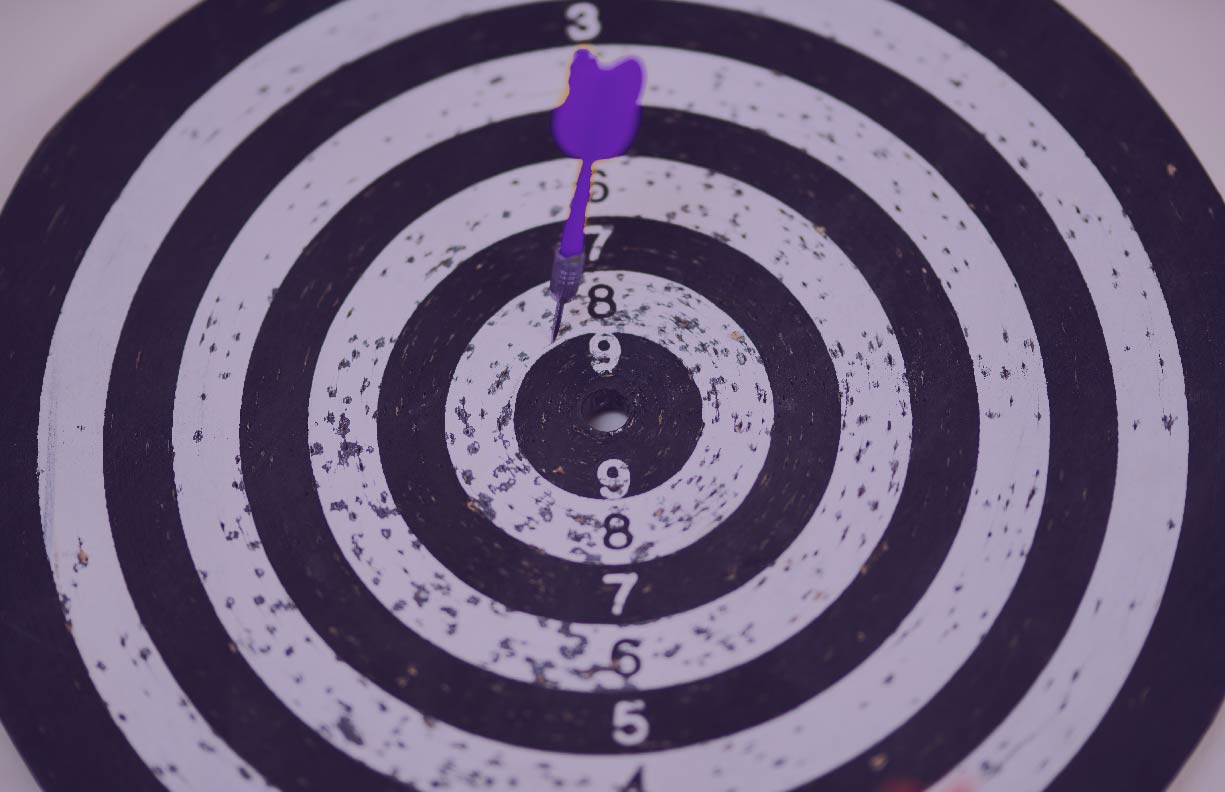 Target with a dart close to the center