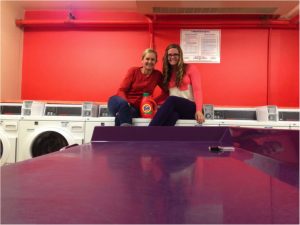 Beth and Hannah Clements doing laundry at Clemson House