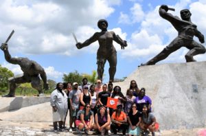 The study abroad cohort in front of the Monument to the Slaves’ Rebellion at the Triunvirato Sugar Mill in the province of Matanzas, where they learned about the nation’s history of slavery and how it continues to shape Cuban heritage and tourism