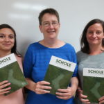 (L to R): Drs. Mariela Fernandez, Gwynn Powell and Lauren Duffy with their copies of the SCHOLE special issue.