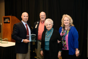 Dr. Brownlee (left) with members of the Box family and Dr. Sharp’s Benton H. Box award.