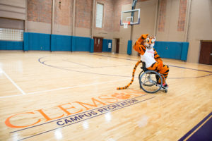 Clemson Tiger playing wheelchair basketball in Fike Recreation Center. 