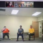 A picture of a Zoom screen, showing Clemson University interns working both in-person and virtually with Rainbow Gang participants.