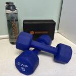 A water bottle, yoga block, and pair of dumbbells.