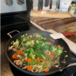 vegetable stir fry cooking on stove