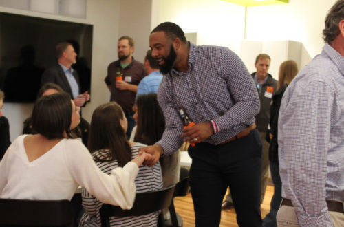 Tajh Boyd shakes hand with a GC student.
