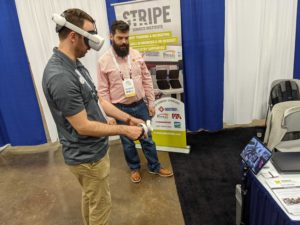 Nate Newsome, Virtual Reality Developer, demonstrates the Sonoco Institute’s VR print training platform, STRIPE (vr.sonocoinstitute.com) at INFOFLEX.