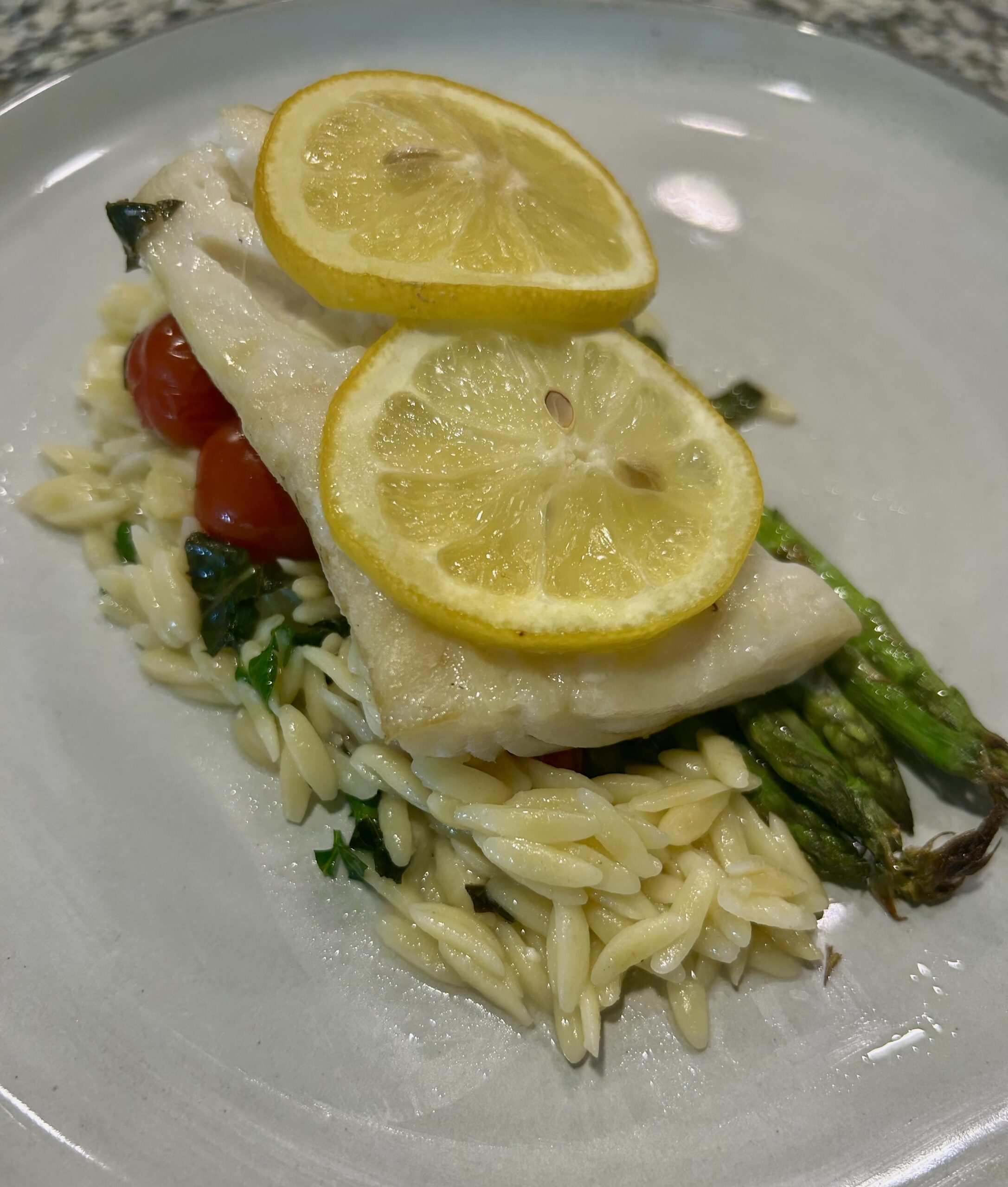 Cod and orzo parchment packet