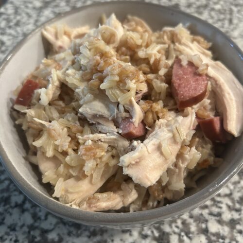 Whole grain chicken bog made with brown rice and farro along with turkey smoked sausage and pulled chicken breast