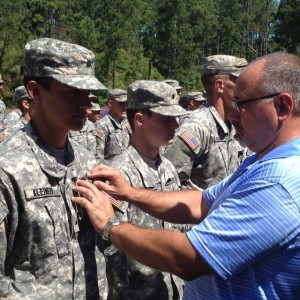 Dad pinning on my wings