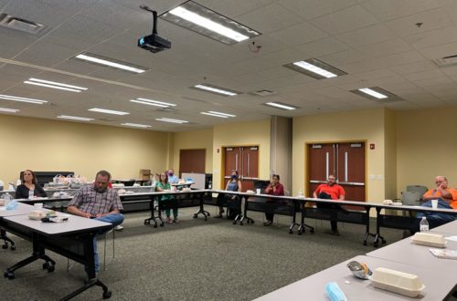 Members of the Cherokee County Extension Advisory Council listening to speaker, Chris LeMaster.