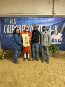 Laura Haddon, Chris LeMaster, and Peter Wilkins recognized Robert Blanton for his hard work and dedication to the youth of 4-H and specifically to the Cherokee County 4-H Spring Livestock Show.
