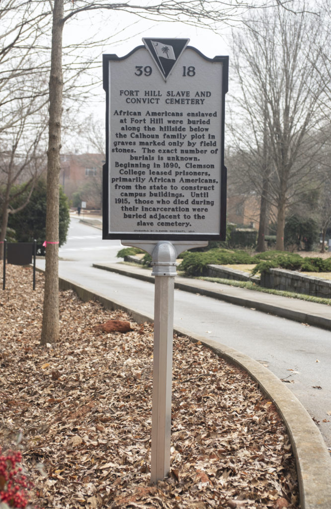 The South Carolina Historical Marker for The Fort Hill Slave and Convict Burial Ground and Woodland Cemetery.