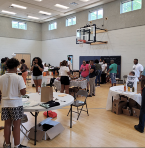 Local businesses and community members mingle at the Black Business Expo.