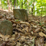 Fieldstones marking unknown graves in Woodland Cemetery at Clemson University.